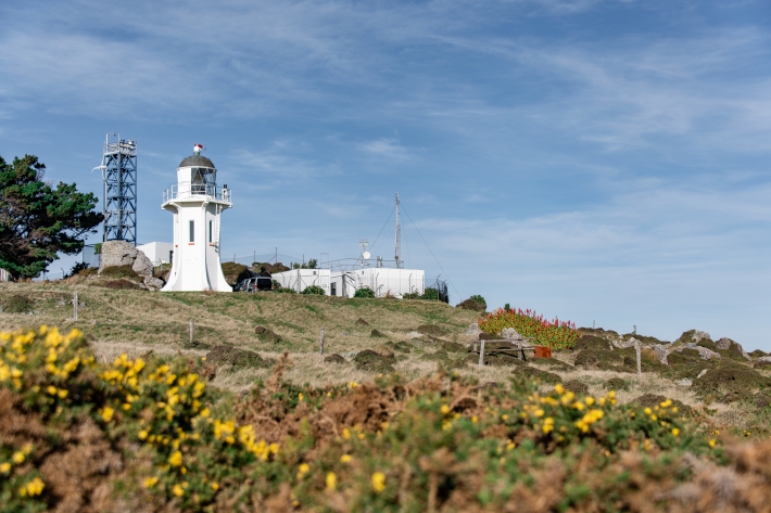 Baring Head Research station and lighthouse on a sunny day